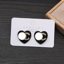 Load image into Gallery viewer, Crystal Rhinestone cc Stud Earrings.
