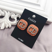 Load image into Gallery viewer, Crystal Rhinestone cc Stud Earrings
