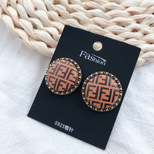 Load image into Gallery viewer, Crystal Rhinestone cc Stud Earrings
